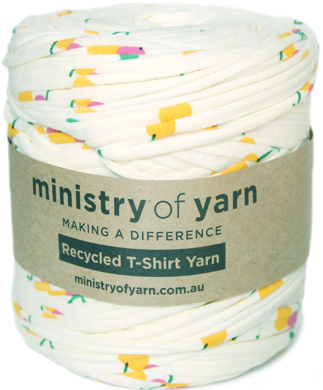 A skein of white recycled T-shirt yarn with a colorful fruit print pattern, wrapped in a brown paper label that reads 'ministry of yarn'.