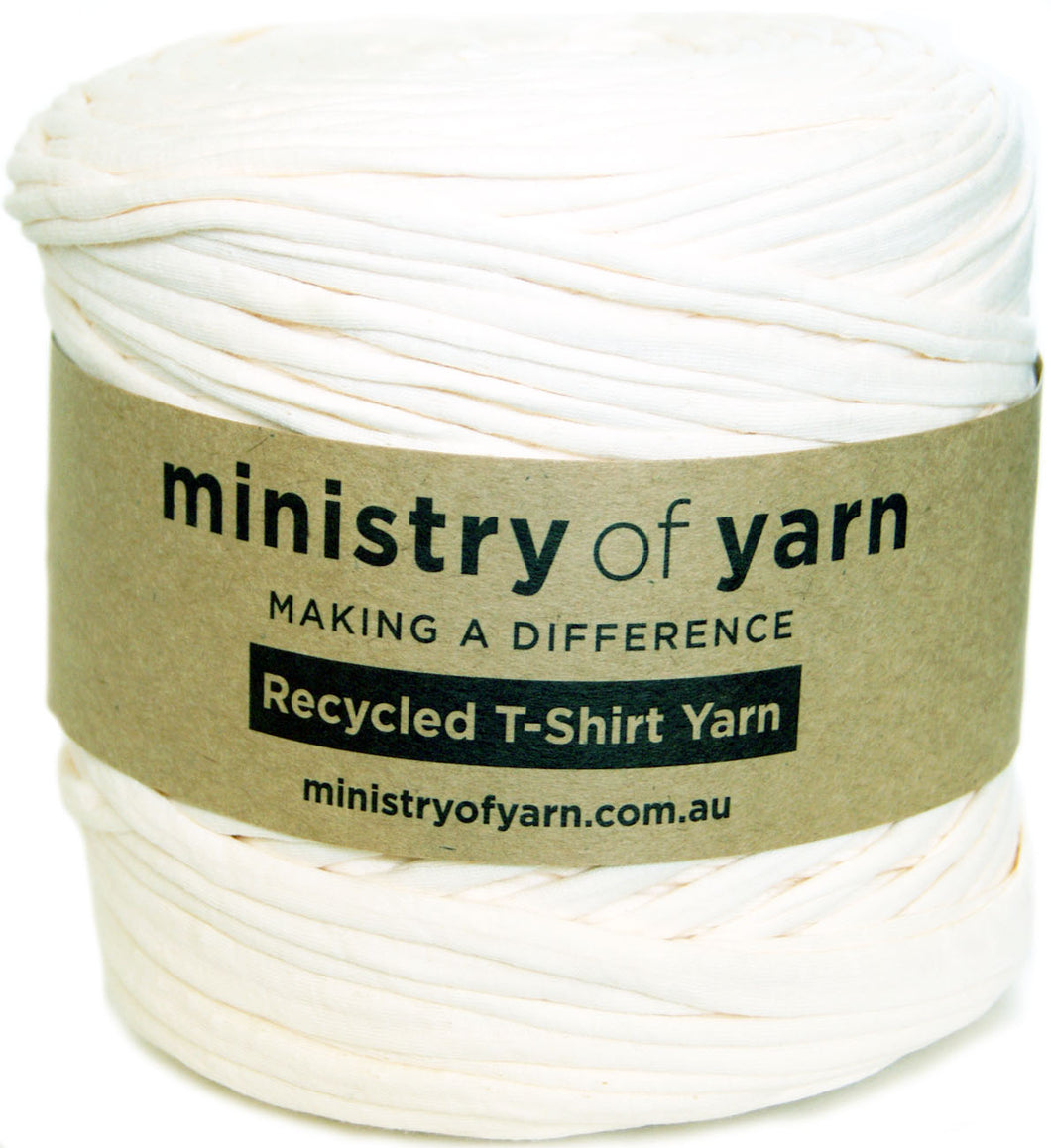 A skein of off-white recycled T-shirt yarn wrapped with a brown paper label that reads 'ministry of yarn' and 'Recycled T-Shirt Yarn'.