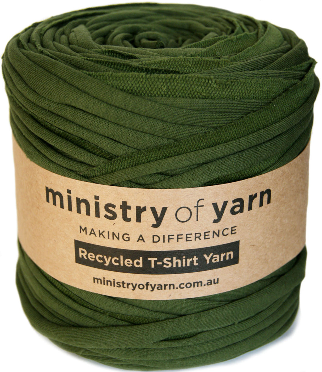 Green roll of recycled t-shirt yarn with 'ministry of yarn' label on a white background