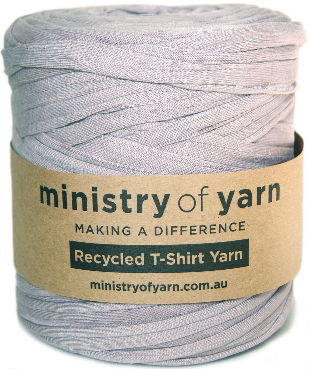A spool of light, dusty-purple recycled T-shirt yarn wrapped in a brown paper label that reads 'ministry of yarn' and 'Recycled T-Shirt Yarn'.