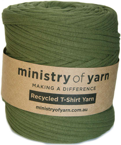 Green yarn roll with 'ministry of yarn' label on a white background