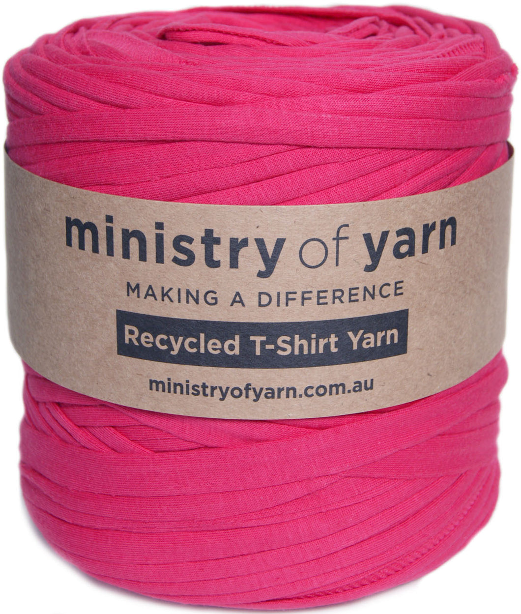 A skein of bright pink recycled T-shirt yarn wrapped in a brown kraft paper label that reads 'ministry of yarn'.