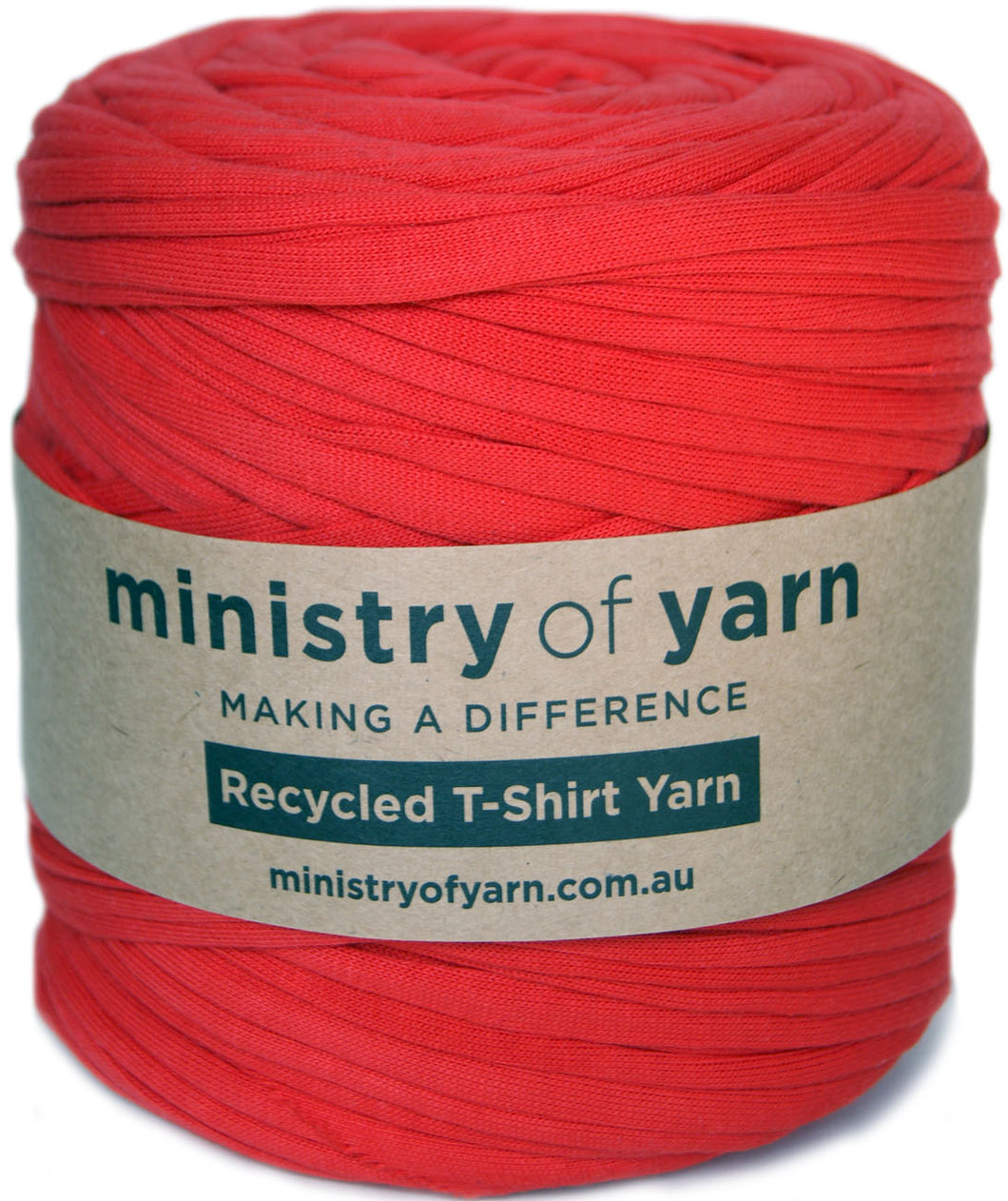 A large spool of bright red recycled T-shirt yarn wrapped with a kraft paper label that reads 'ministry of yarn'.