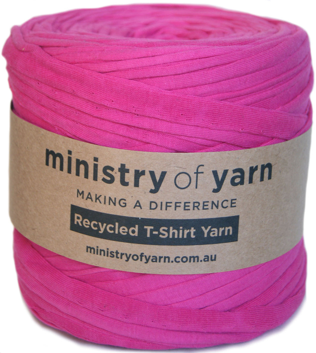 Pink yarn ball with 'ministry of yarn' label on a white background