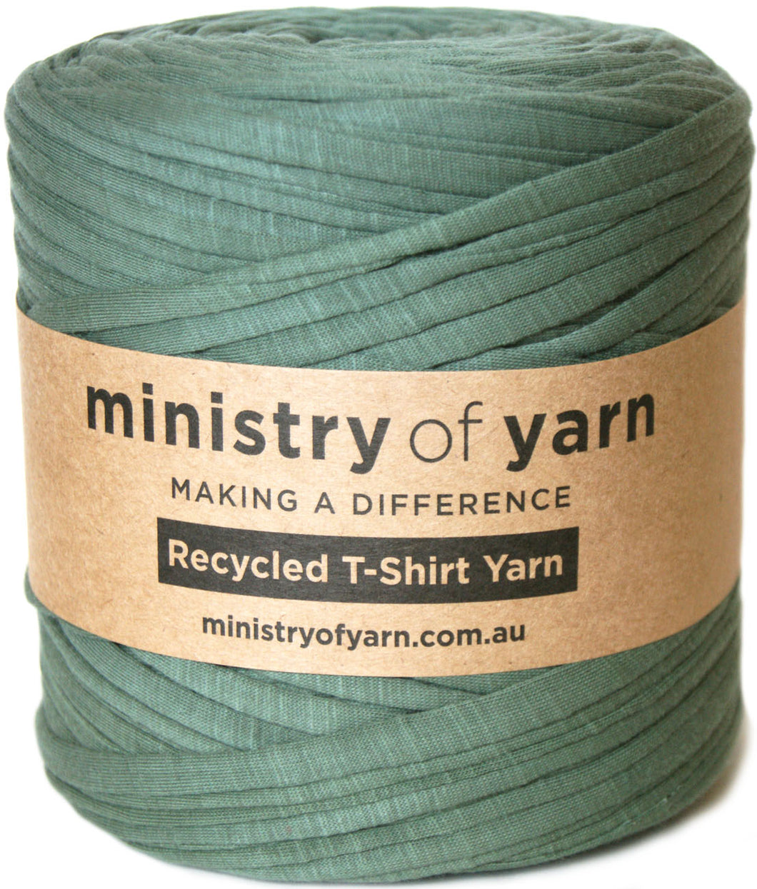 A spool of sage green recycled T-shirt yarn wrapped with a brown paper label that reads 'ministry of yarn'.