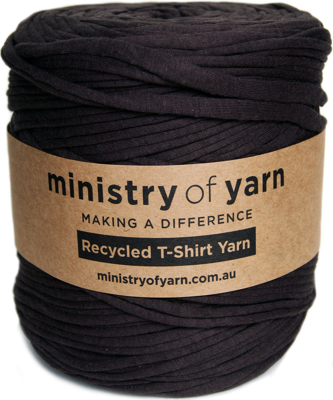 A large spool of dark brown recycled t-shirt yarn wrapped with a brown paper label that reads 'ministry of yarn'.