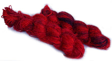 Red recycled spun sari silk yarn